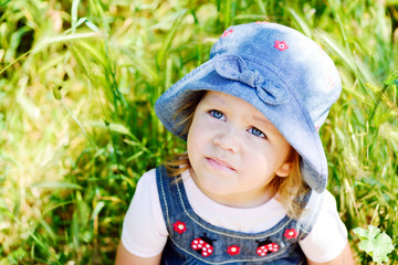 toddler in grass