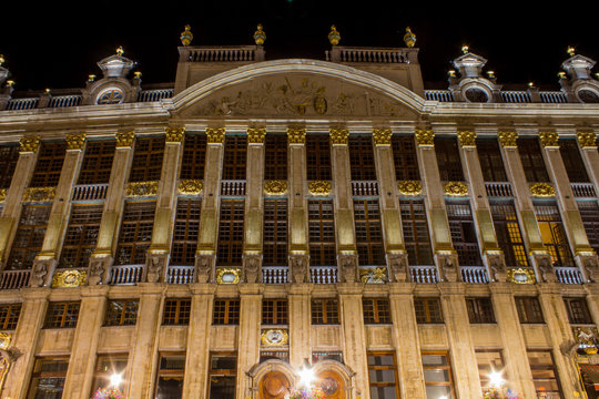 on of brussels grand place buildings at night