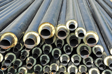 Steel pipe with heat insulation on construction site