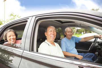 happy seniors enjoying road trip and travel