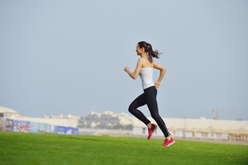 Fototapeta na wymiar woman jogging at morning