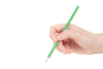 Caucasian hand with green pencil