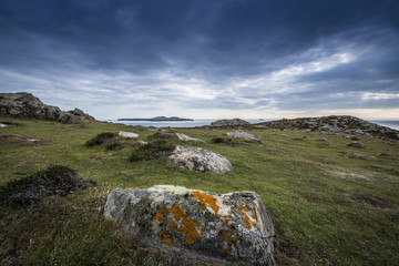 rocky coastline and sea in the sunset time - England