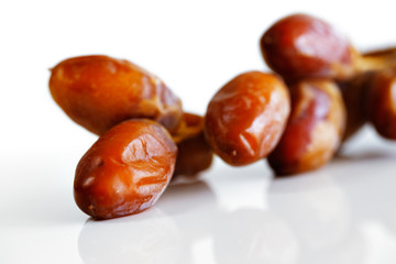 Obraz premium Arabic dates shot on a white background