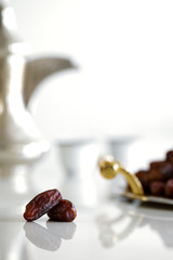 Dried dates and Arabic coffee