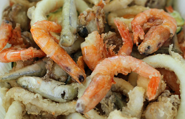 fried fish with crispy fried shrimp and vegetables
