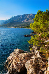 Beautiful view of the rocky coast with blue sea, Croatia - obrazy, fototapety, plakaty
