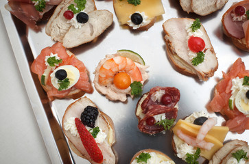 Delicious appetizer close-up on silver plate