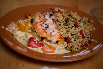 Grilled salmon with shrimps and rice