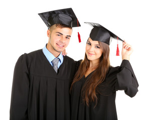 Two happy graduating students isolated on white