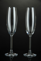 Empty glasses on black background