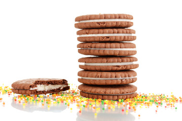 Chocolate cookies with creamy layer isolated on white