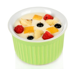 Delicious yogurt with fruit isolated on white