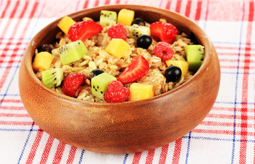 Oatmeal with fruits close-up