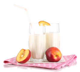Delicious milk shakes with peach isolated on white