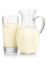 Milk in jug and glass isolated on white