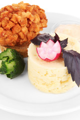 Chicken Kiev  and mashed potatoes on plate, isolated on white
