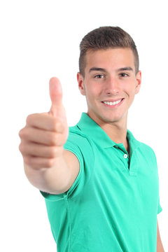 Handsome teenager boy with thumb up isolated