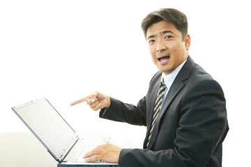 ガッツポーズのビジネスマン