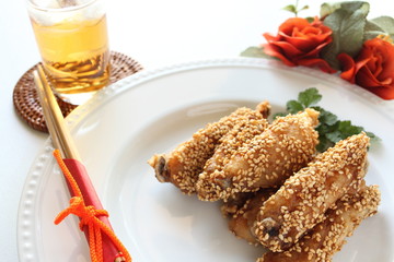 Chinese cuisine, sesame chicken wings and drink