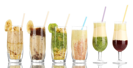 Delicious fruit smoothies isolated on white