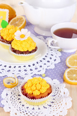 Beautiful lemon cupcakes and flavored tea