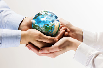 Earth planet in hands