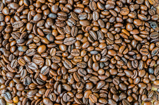Close up coffee beans © siraphol
