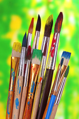 Fototapeta premium Many brush in paint on nature background