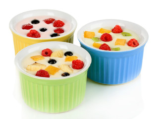 Delicious yogurt with fruit isolated on white