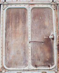 Very old iron door with rusty details