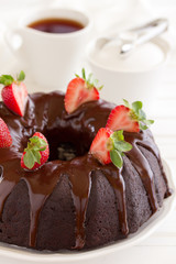 Chocolate cake with strawberries and chocolate.