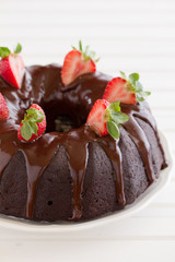 Chocolate cake with strawberries and chocolate.