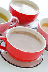 Various cups of tea and coffee