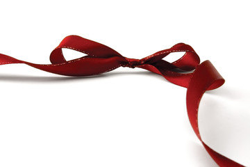 Red ribbon , isolated on white background