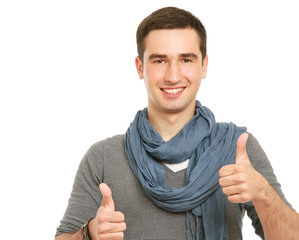 A smiling man showing thumb up sign