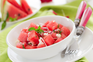 Salad with watermelon, cheese and mint.