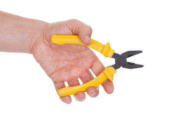 Hand Holding Plier With Yellow Grips