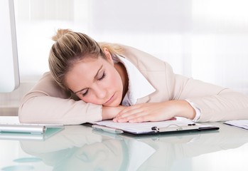 Exhausted Young Businesswoman Sleeping