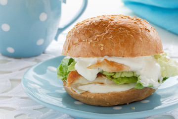 Burger with chicken and cheese.