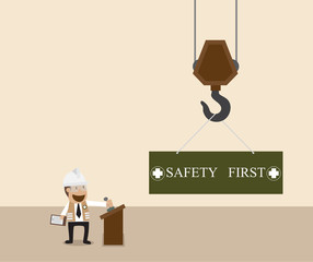 Businessman control crane hanging with safety first sign © BirDiGoL