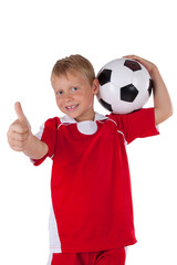 lachender Junge mit Fussball