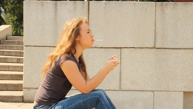 A young girl with a cigarette