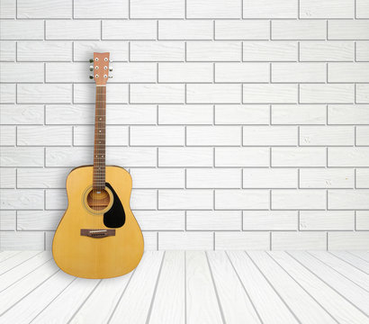 Guitar in empty room background © geargodz