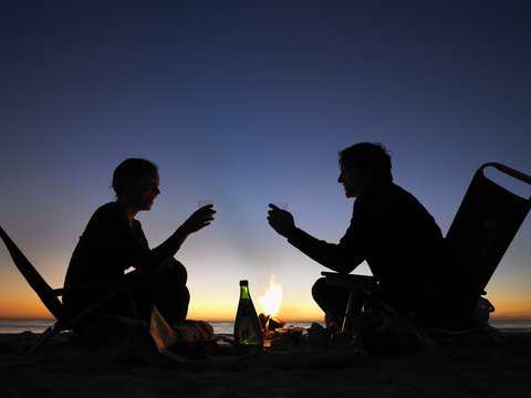 Couple On The Beach By Night