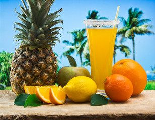 orange juice in a glass on a table