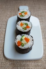 Vegetarian sushi maki rolls with tofu and nori seaweed