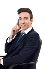 Young businessman talking on the phone.Happy phone conversation.