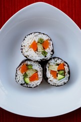 Vegetarian sushi maki rolls with tofu and nori seaweed