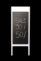 30 and 50 discount sign written with chalk